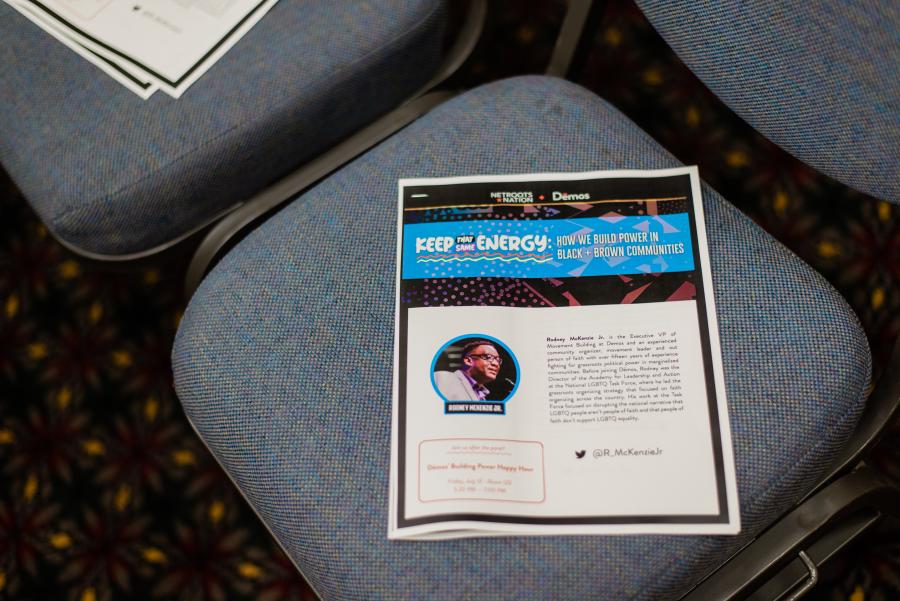 A Keep That Same Energy handout on a chair at Netroots