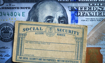 Federal reserve note behind social security card