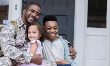 Black veteran with children