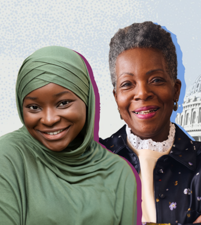 Two women standing in front of the Capitol building, symbolizing democracy and political power.